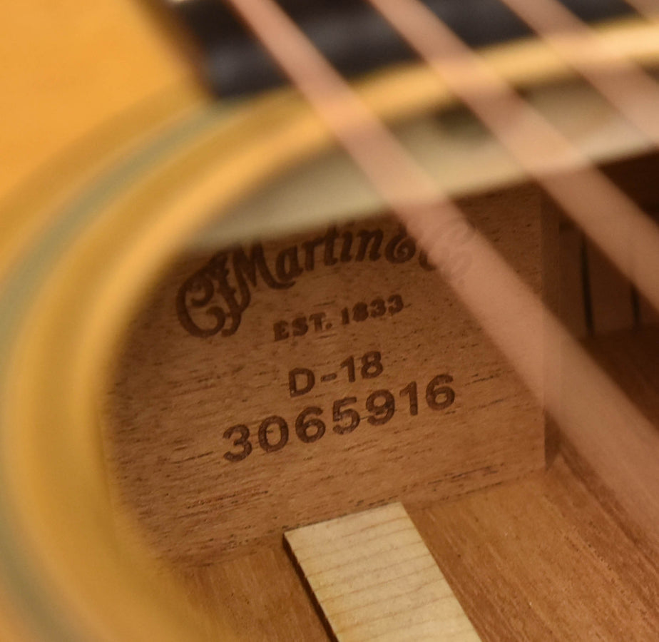 D-18 acoustic guitar label on soundboard with serial-style number mark