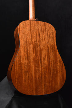 gloss dreadnought acoustic guitar back view with rich wood grain pattern