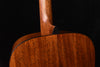 Gloss dreadnought acoustic guitar close-up of upper back and neck joint