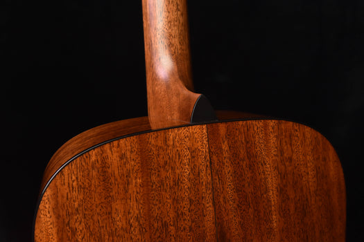 gloss dreadnought acoustic guitar close-up of upper back and neck joint