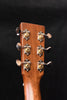 Dreadnought acoustic guitar headstock close-up with chrome tuning pegs