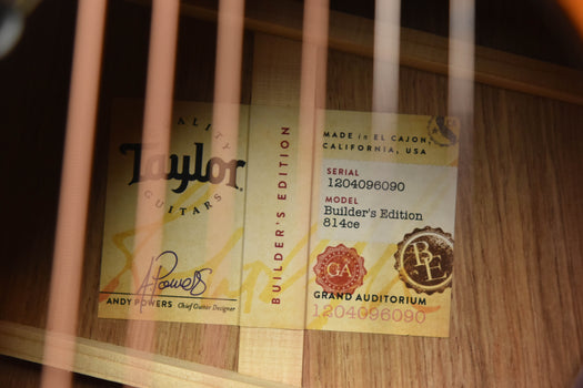 acoustic guitar inside labels on the wood body near the soundhole