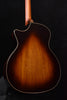 Acoustic guitar back with lighter center grain and arched silhouette