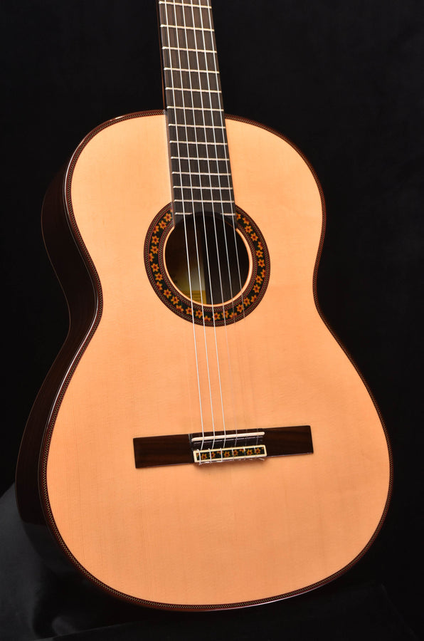 Jose Ramirez classical guitar close-up of spruce top, rosette sound hole, and bridge
