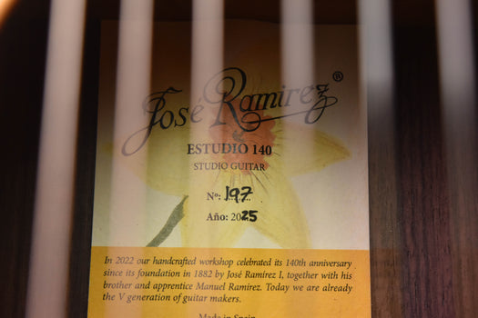 classical guitar label with jose ramirez studio 140 and handwritten number 197