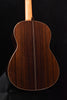Jose Ramirez classical guitar back view with dark wood grain and center line