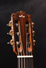 Cordoba classical guitar headstock with tuning machines and wood-grain finish
