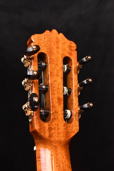 cordoba classical guitar headstock with six tuning pegs and machine hardware