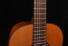 Classical guitar fretboard and strings close-up