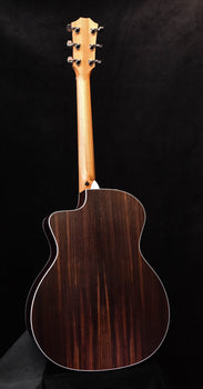 acoustic guitar back with dark wood finish and light binding