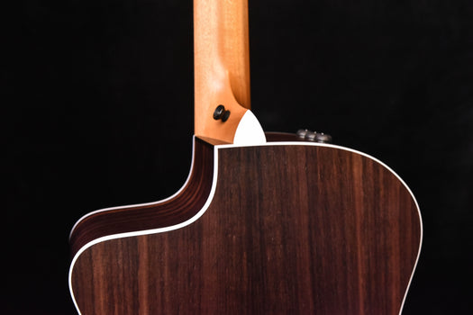 neck joint and upper body of acoustic guitar with binding details