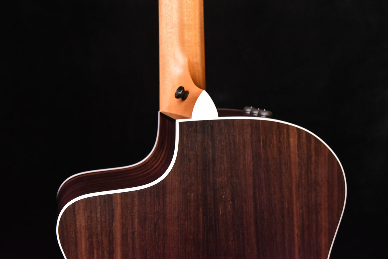 Neck joint and upper body of acoustic guitar with binding details