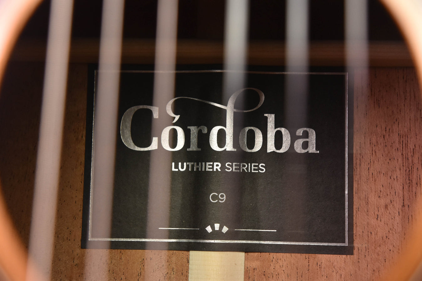 Cordoba C9 luthier series label on guitar soundboard