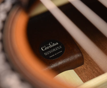 cordoba serial stamp on guitar body with made in china text