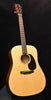 Super D-18 acoustic guitar with light wood body and dark pickguard