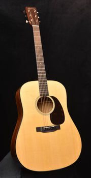 super d-18 acoustic guitar with light wood body and dark pickguard