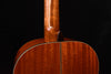 Classical guitar neck-body joint with glossy wood finish