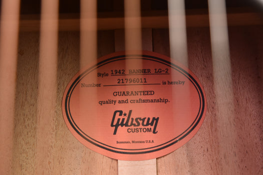 gibson branded soundboard label with “guaranteed quality and craftsmanship” text