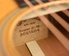 Headstock label with serial text and “Super D-18” marking