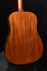 Back view acoustic guitar body showing wood grain and center seam