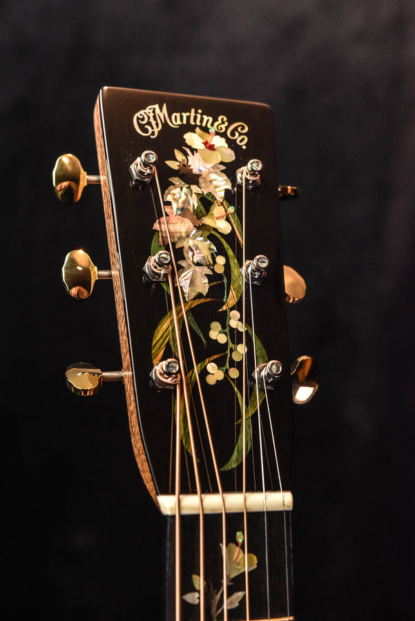 Martin O'ahu K-42 Hibiscus acoustic guitar headstock with flower inlay and tuning pegs