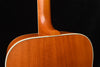 Acoustic guitar neck joint and top section with glossy wood grain