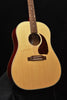 Natural acoustic-electric guitar front view with tortoiseshell pickguard and soundhole