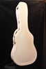 White acoustic guitar body with curved back and strap button