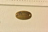 Martin logo badge on textured acoustic guitar finish