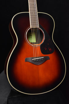 yamaha fs830 acoustic guitar front view, rosette, bridge, and pickguard visible
