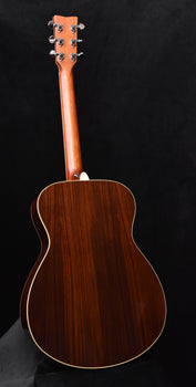 acoustic guitar back with dark wood grain and cream binding line