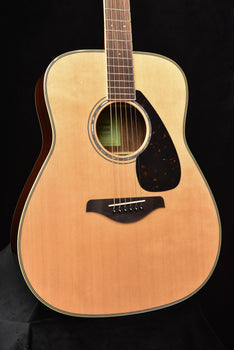 fg830 natural acoustic guitar, close-up front view with rosette and bridge area