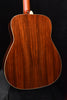 FG830 Natural acoustic guitar back view, detailed wood grain pattern and binding edge