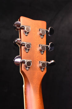 fg830 natural acoustic guitar headstock close-up with tuning machines and screws