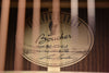 Acoustic guitar interior label showing Boucher model BG-52-GM and serial text