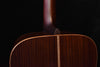 Acoustic guitar upper back/shoulder view with cutaway curve and side seam trim