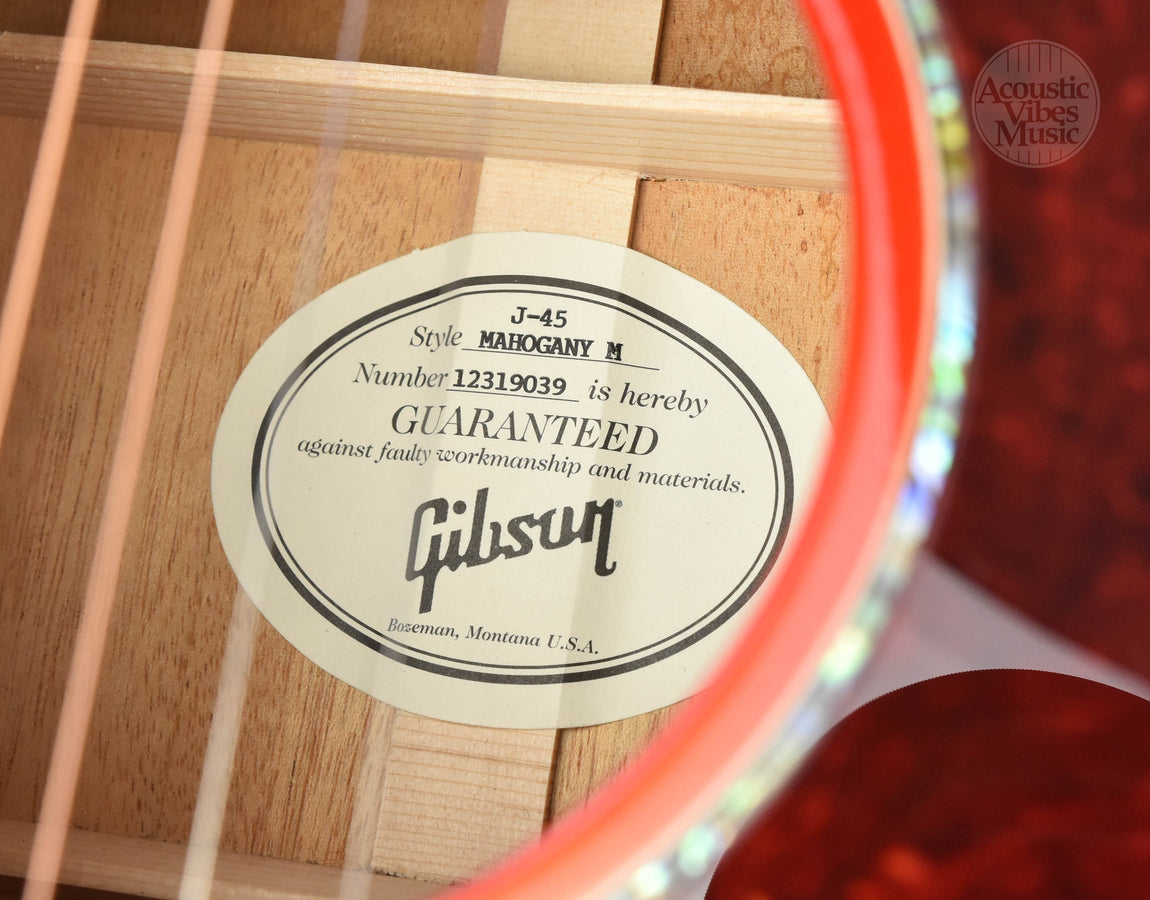 Guitar warranty label on the inside of the soundbox