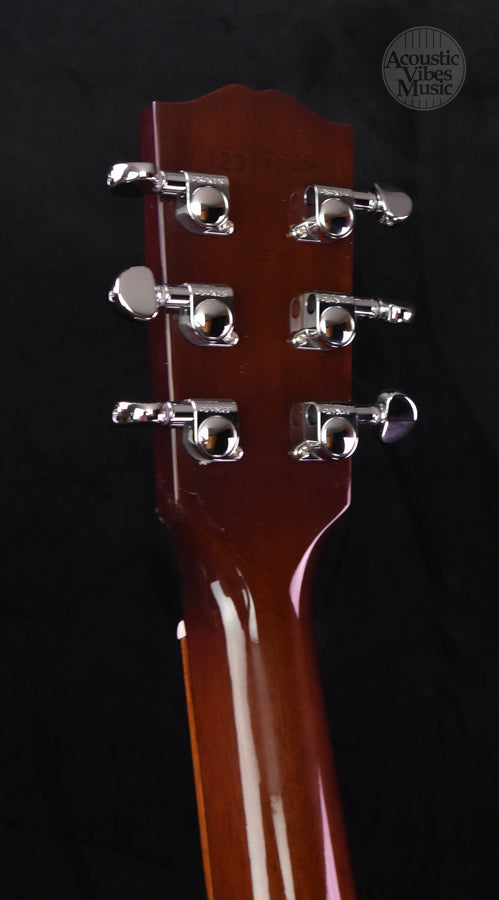 Gibson J-45 headstock with 6 chrome tuning pegs, light cherry burst finish