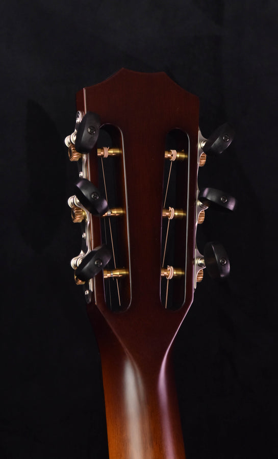V-Class Koa guitar headstock with tuners and 12-fret neck join