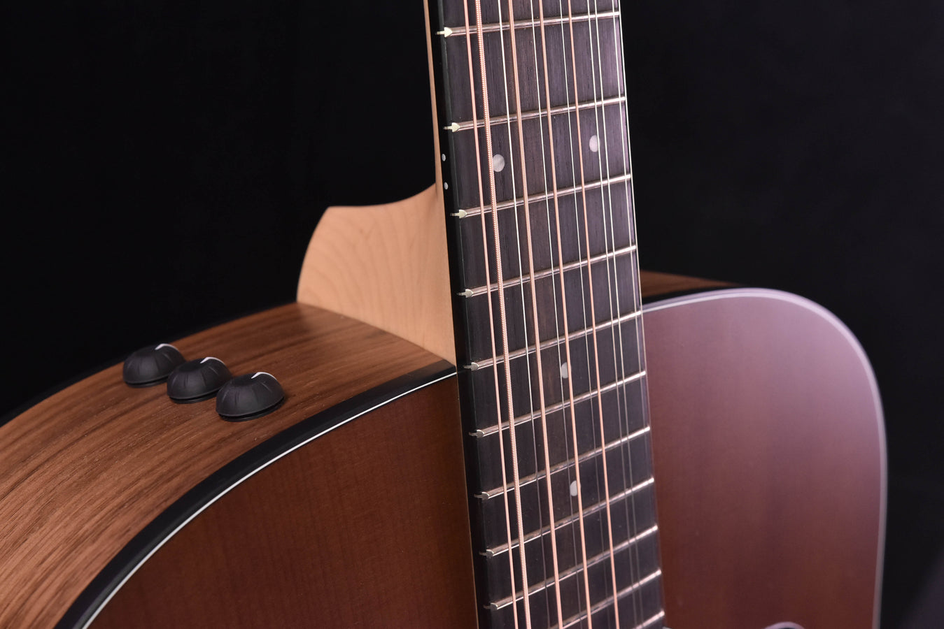 Taylor 150E Sunburst Prototype  Walnut/Spruce top.