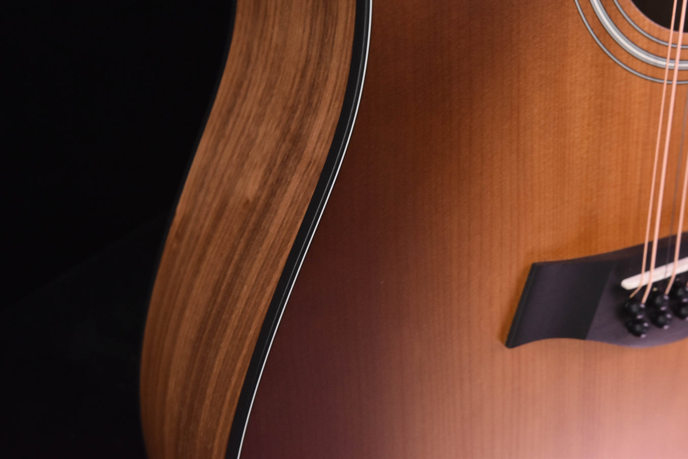 Taylor 150E Sunburst Prototype  Walnut/Spruce top.