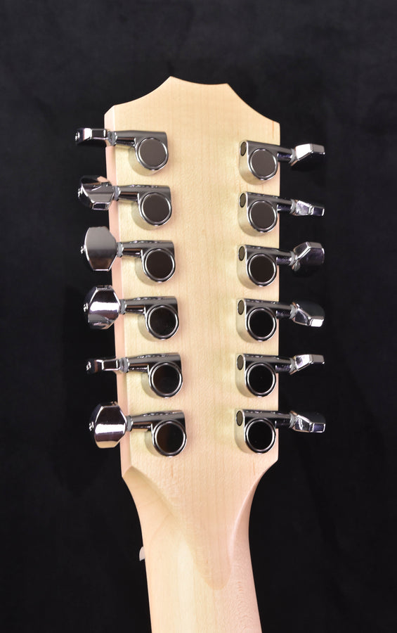 Taylor 150E Sunburst Prototype  Walnut/Spruce top.