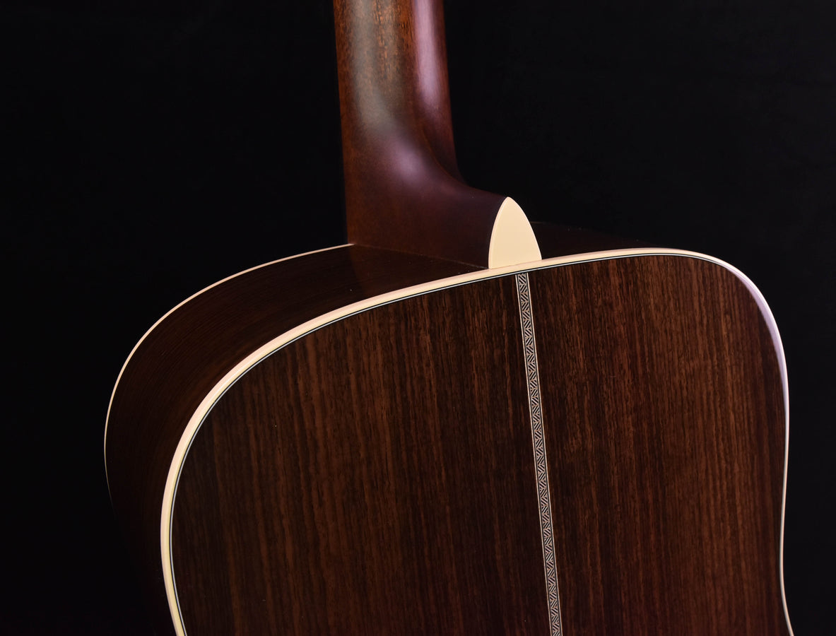 Upper guitar body with cream binding, neck joint, and center seam