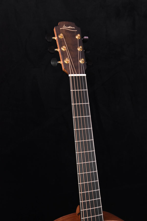 Lowden F50 headstock close-up with tuning machines and fretboard extending down
