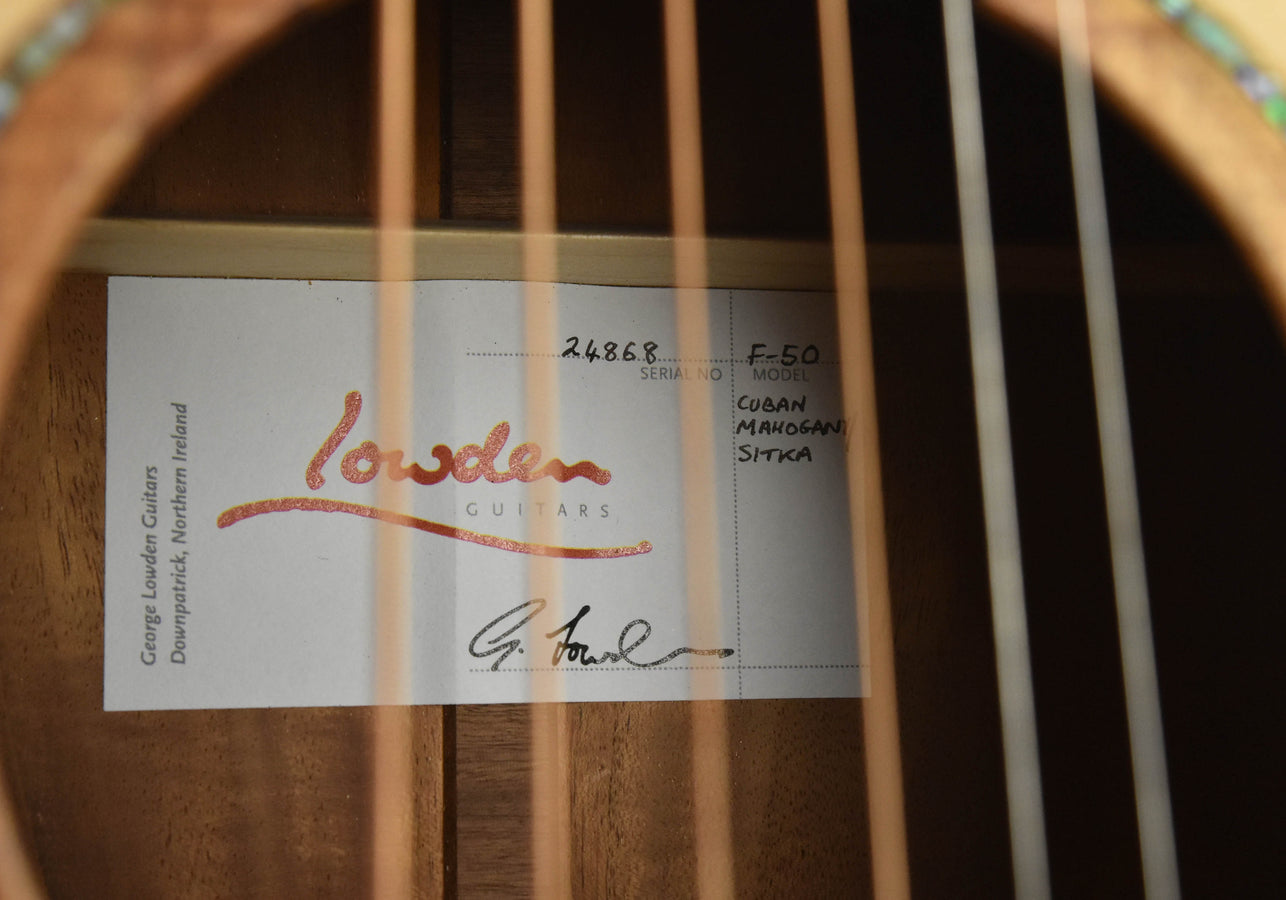 Soundboard label: F-50, serial 24868, Cuban Mahogany and Sitka Spruce