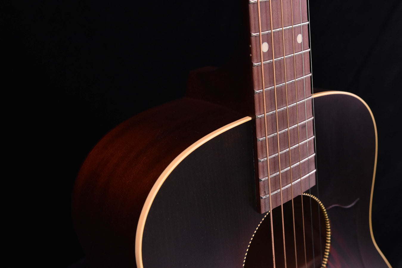 Iris DE-11 acoustic guitar body edge and bridge area beside the fretboard