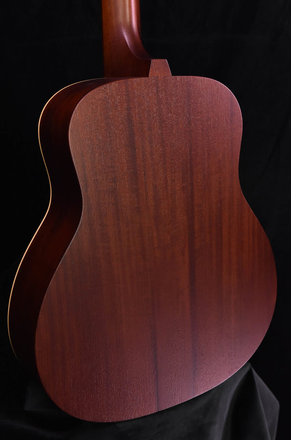 DE-11 acoustic guitar back close-up with pronounced center seam and wood texture