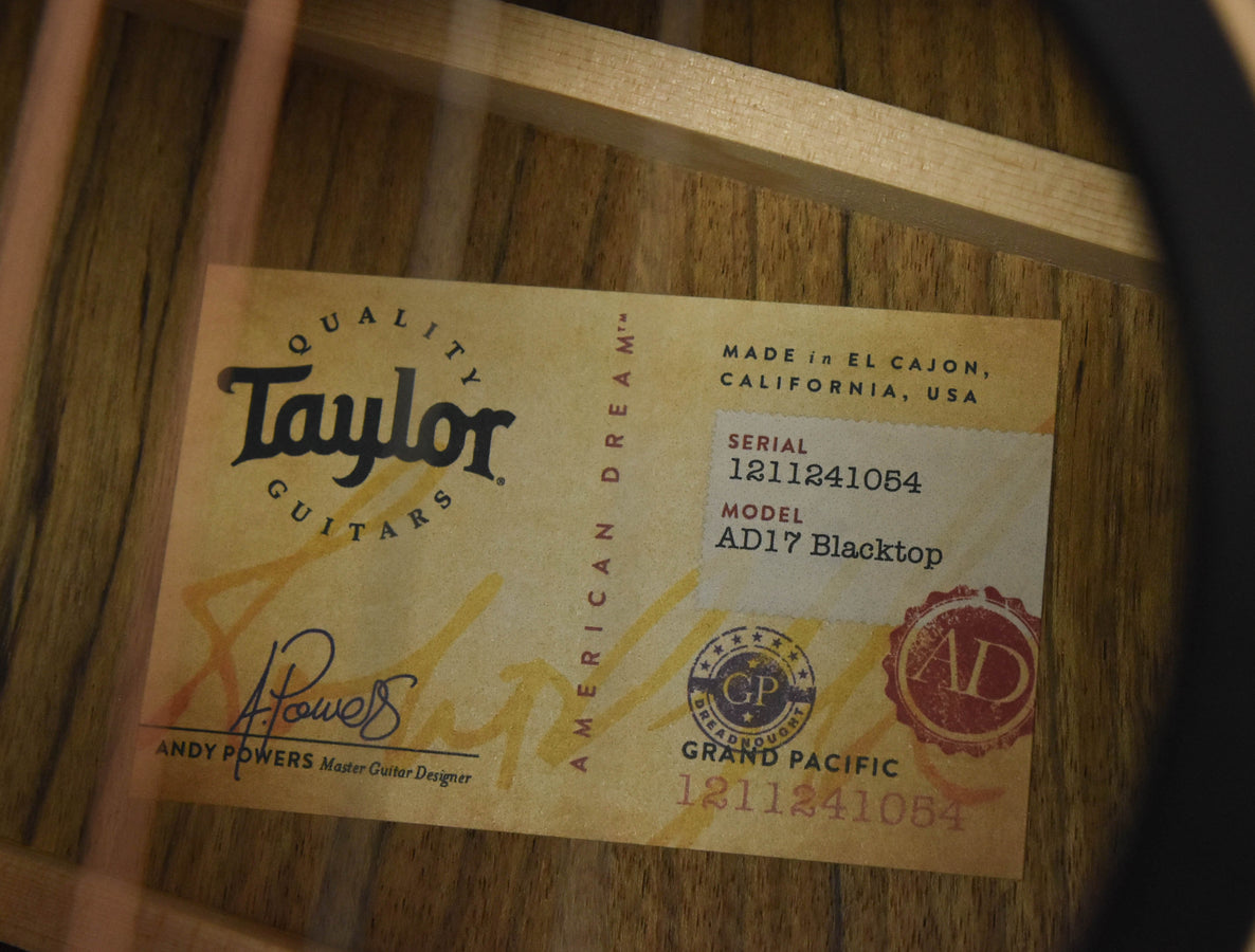 Guitar neck label showing serial number and AD17 Blacktop model
