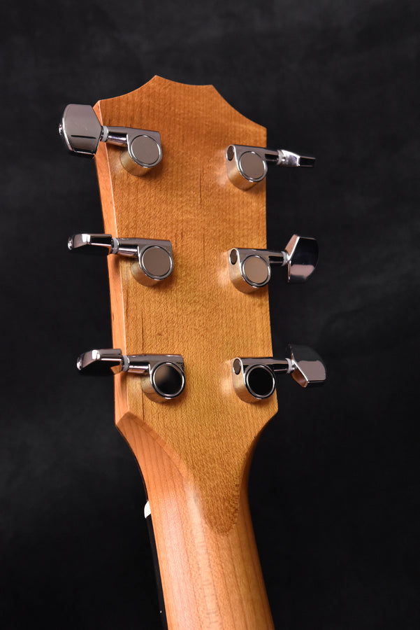 110E headstock front view with chrome tuning machines