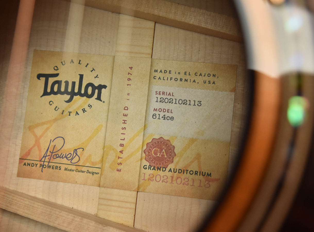 Taylor interior label showing serial and model 614ce inside the guitar
